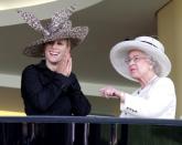 <p>With her granddaughter, Zara Tindall</p>