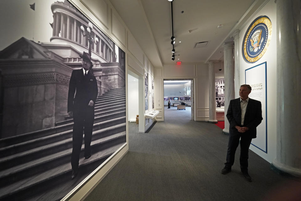 Museum director Kurt Graham leads a tour of the Harry S. Truman Presidential Library and Museum Wednesday, June 9, 2021, in Independence, Mo. The facility will reopen July 2 after a nearly $30 million renovation project. (AP Photo/Charlie Riedel)