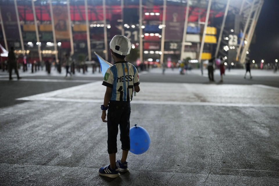 FILE - An Argentina soccer fan from India waits outside before the World Cup group C soccer match between Poland and Argentina at the Stadium 974 in Doha, Qatar, Wednesday, Nov. 30, 2022. (AP Photo/Natacha Pisarenko, File)