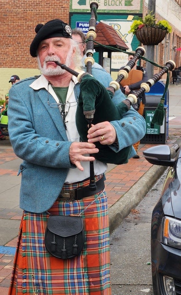 A bagpipe player performs at last year's St. Patrick's Day Parade in Tryon.