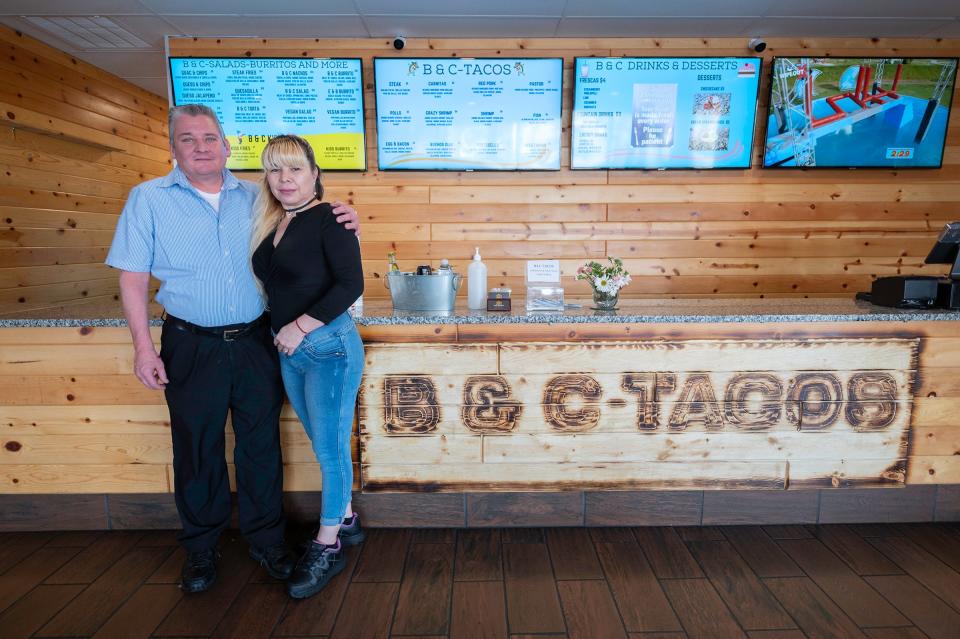 Owner Bruce Deveraux and wife Marisol Ivette Deveraux stand at the counter of the recently opened B&C Tacos Inc. on Wednesday, March 1, 2023.
