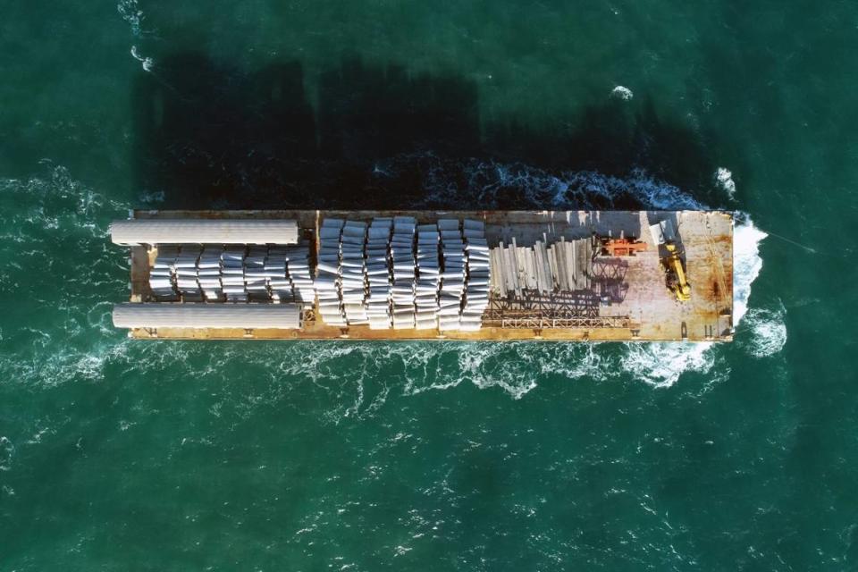 Concrete materials and retired MARTA railcars are placed at Artificial Reef L about 23 nautical miles east of Ossabaw Island on Thursday, Dec. 21, 2023.