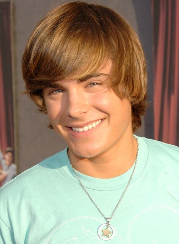 Zac Efron smiles at a DVD launch gala "High School Musical" event on May 13, 2006