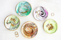 <p><b>Marble Jewellery Dishes</b> Another chance to have fun with some polymer baking clay, these cute dishes are a doddle and need barely any materials, besides the clay. <a rel="nofollow noopener" href="http://www.abeautifulmess.com/2014/11/marbled-clay-ring-dish.html?crlt.pid=camp.HTUR9VzM3Xz2" target="_blank" data-ylk="slk:A Beautiful Mess;elm:context_link;itc:0;sec:content-canvas" class="link ">A Beautiful Mess</a> will show you just how easy they are to make. </p>