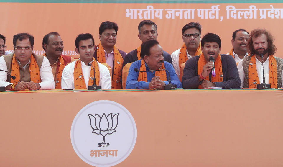 Newly elected lawmakers from India's ruling Bharatiya Janata Party, from left, Parvesh Singh Verma, Gautam Gambhir, Harsh Vardhan, Manoj Tiwari and Hans Raj Hans attend a press conference in New Delhi, India, Saturday, May 25, 2019. The Election Commission announced that the BJP won 303 out of 542 seats in the Lok Sabha, the lower house of Parliament, after the official vote count finished Friday. That is well beyond the simple majority a party in India needs to form a government. (AP Photo/Altaf Qadri)