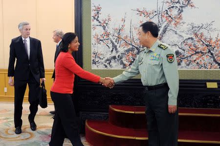 U.S. National Security Adviser Susan Rice (C) shakes hands with Deputy Chairman of China's Central Military Commission Fan Changlong at the Bayi Building in Beijing September 9, 2014. REUTERS/Wang Zhao/Pool