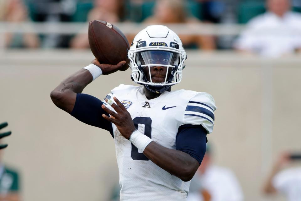 Akron quarterback DJ Irons throws a pass against Michigan State during the first quarter of an NCAA college football game, Saturday, Sept. 10, 2022, in East Lansing, Mich. (AP Photo/Al Goldis)