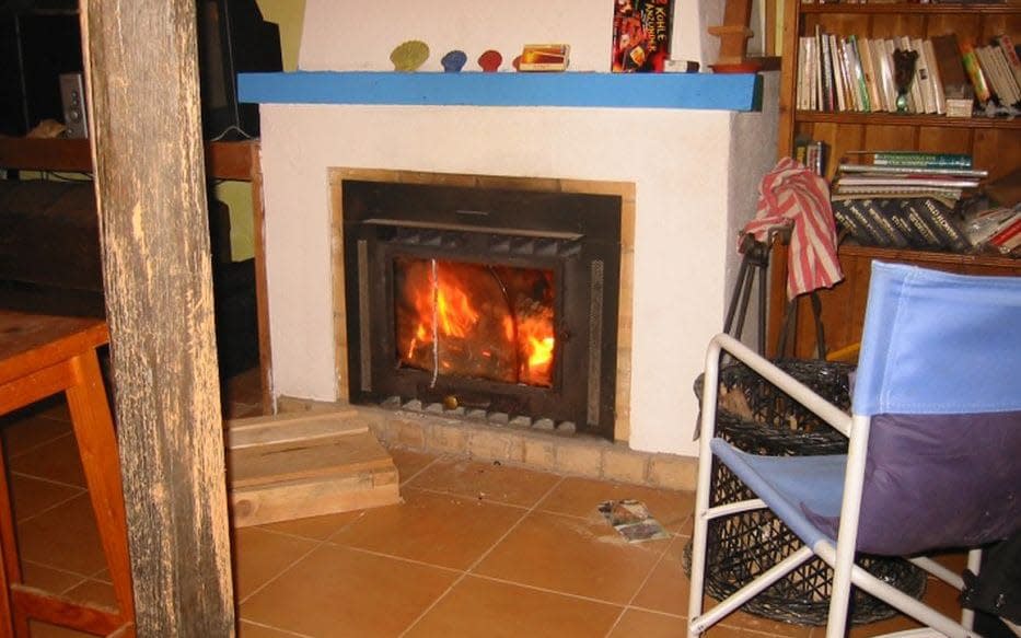A fireplace inside one of the houses