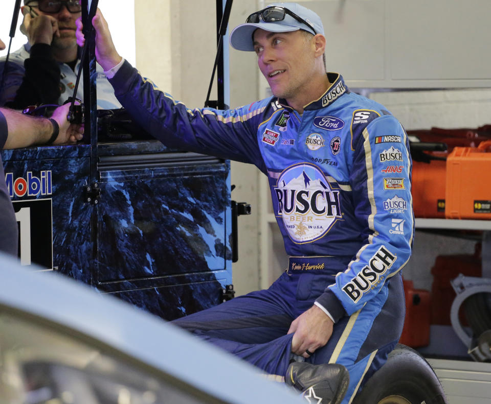 Kevin Harvick waits in the garage for a NASCAR Cup Series auto race practice to begin on Friday, Nov. 15, 2019, at Homestead-Miami Speedway in Homestead, Fla. Harvick is one of four drivers racing for the series championship. (AP Photo/Terry Renna)