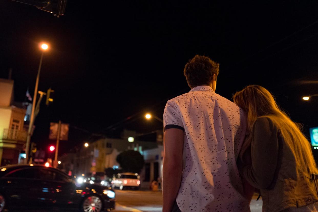 Americans are deciding to be childfree at a far younger age than previously thought. <a href="https://www.gettyimages.com/detail/news-photo/young-couple-viewed-from-behind-walks-down-a-street-with-news-photo/614380516?adppopup=true" rel="nofollow noopener" target="_blank" data-ylk="slk:Photo via Smith Collection/Gado/Getty Images;elm:context_link;itc:0;sec:content-canvas" class="link ">Photo via Smith Collection/Gado/Getty Images</a>