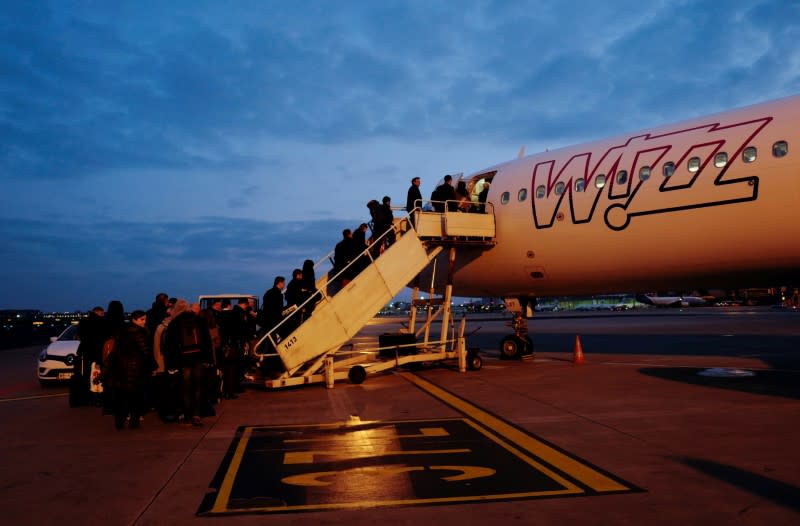 FILE PHOTO: Wizz Air Airbus 321 aircraft is pictured at the Chopin International Airport in Warsaw