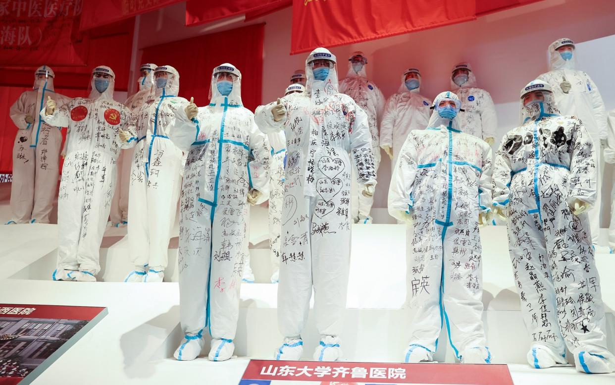 A general view of wax figurines of workers in PPE - Lintao Zhang/Getty Images