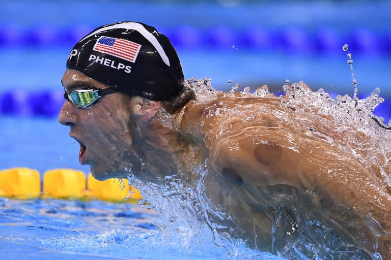 El estadounidense Michael Phelps disputa los 200m mariposa en los Juegos de Rio, el 9 de agosto de 2016 (GABRIEL BOUYS)