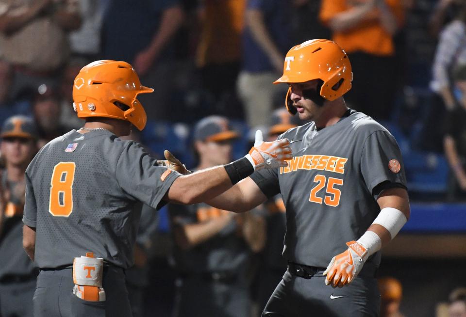 May 24 2024; Hoover, AL, USA; Tennessee batter Blake Burke is congratulated by teammates after hitting a solo homer that proved to be the game winner against Mississippi State at the Hoover Met during the SEC Tournament. Tennessee held on to win 6-5.