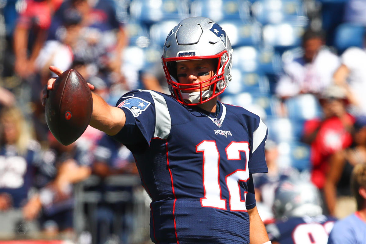 Tom Brady signs last ball he threw as a Patriot, which was intercepted by  his Bucs teammate