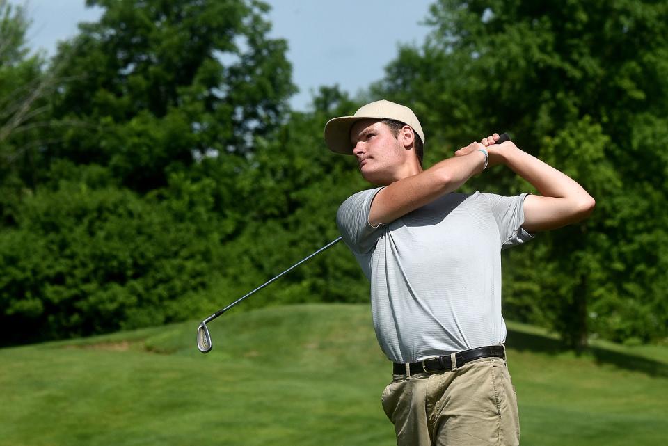 Josh Hackett approaches the green with an iron while participating in the Licking County Junior Golf Association's final event of the season on Monday, July 25, 2022 at Clover Valley Golf Club in Johnstown.