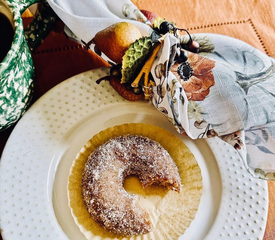 Apple cider reduction enhances the flavor of these tasty donuts.