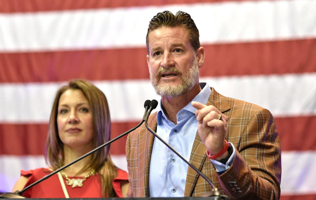U.S. Rep. Greg Steube, a Republican from Sarasota, gives an acceptance speech at Robarts Arena after winning re-election to his District 17 seat in November 2022. His wife, Jennifer Steube, was by his side. He is running for another term in 2024.