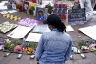 Millicent Cahoon stands for a portrait, Thursday, Sept. 24, 2020, in Louisville, Ky. “It’s reiterating to me that my life does not matter, that I’m unsafe,” said Millicent Cahoon, a therapist who started a counseling network for the protest movement. (AP Photo/John Minchillo)