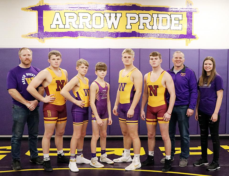 Ryan and Traci Althoff’s family has been a big part of the Watertown High School wrestling program for many years, starting with their sons Nate (left) and Aaron (second from right)  — former WHS wrestlers who now serve as assistant coaches for the Arrows. Also pictured, starting second from left, are brothers Sam, Leo and Max Stroup; and brothers Ben and Ty Althoff and their sister Josie (far right). Sam Stroup and Ty Althoff are former WHS wrestlers who are now sophomore grapplers at Northern State University in Aberdeen. Ben Althoff is a senior wrestler for the Arrows with cousins Leo Stroup, a freshman, and Max Stroup, a seventh-grader. Josie Althoff is a student manager for the Arrows.