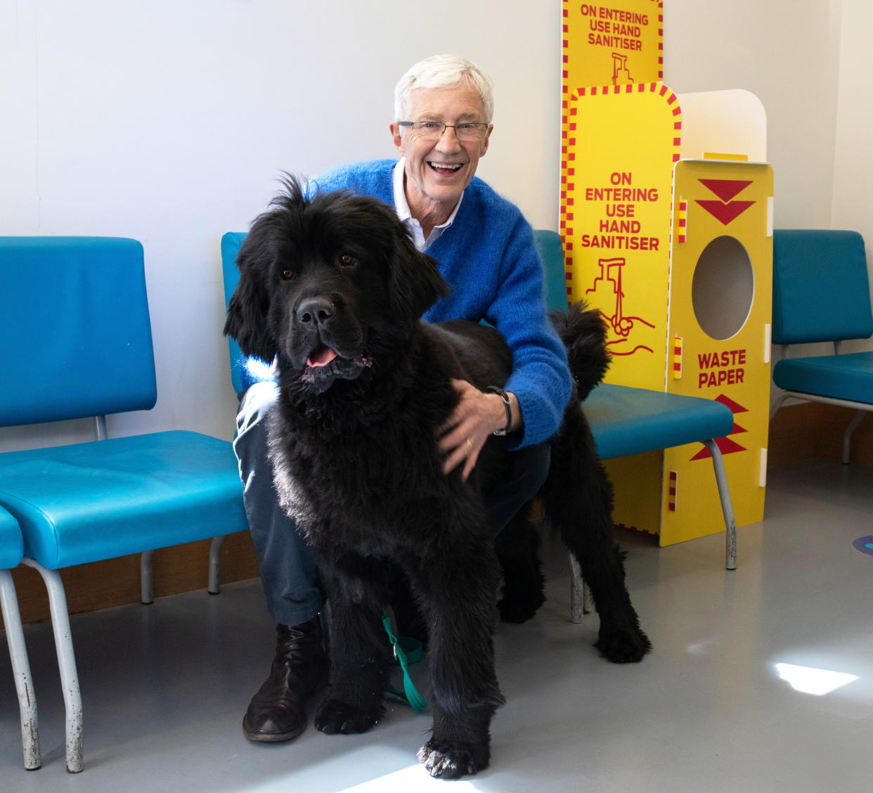 Paul O'Grady at Battersea Cats and Dogs Home with Peggy a Newfoundland. (ITV)