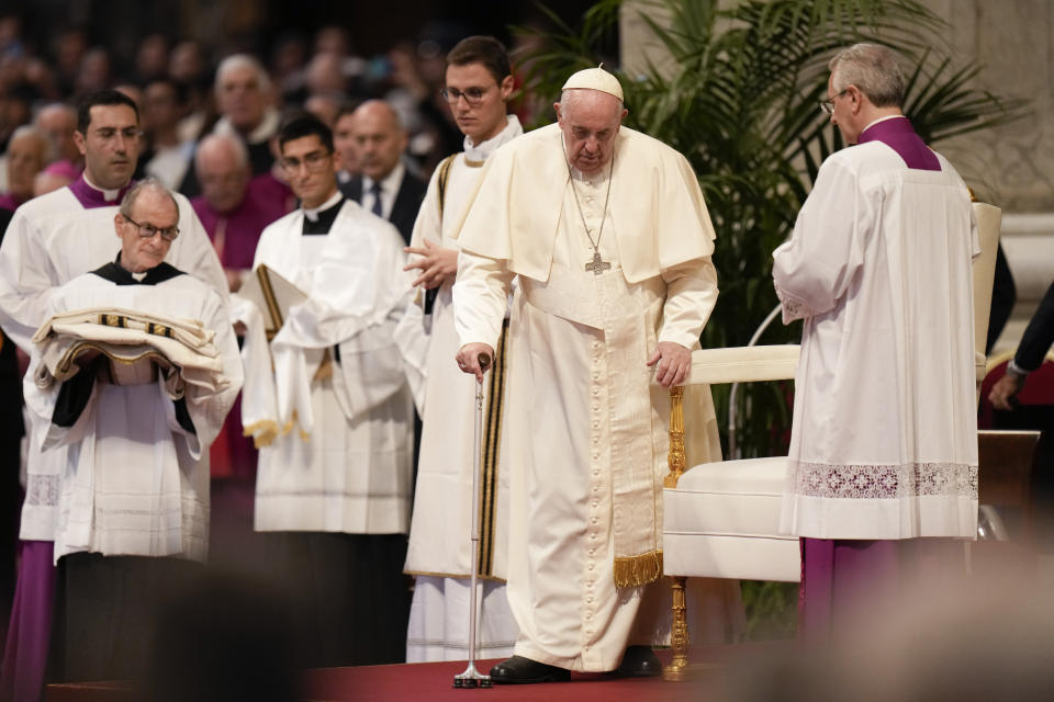 Pope Francis arrives for a mass in St. Peter's Basilica at the Vatican, Tuesday, Oct. 11, 2022. Pope Francis commemorates the 60th anniversary of the opening of the Second Vatican Council by celebrating a Mass in honor of St. John XXIII, the "good pope" who convened the landmark meetings that modernized the Catholic Church. (AP Photo/Alessandra Tarantino)