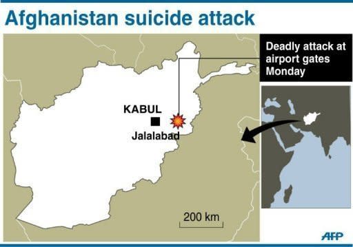 A Taliban suicide car bomber targeting NATO troops at an airport in eastern Afghanistan killed nine people Monday, the seventh day of violence over the burning of the Koran at a US airbase