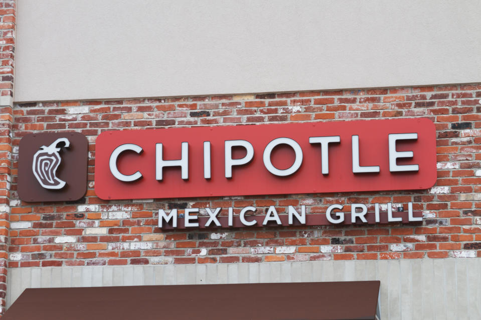 Fairfield, Ohio, USA - February 25, 2011 : Chipotle Mexican Grill Logo on brick building. Chipotle is a chain of fast casual restaurants in the United States and Canada that specialize in burritos and tacos.