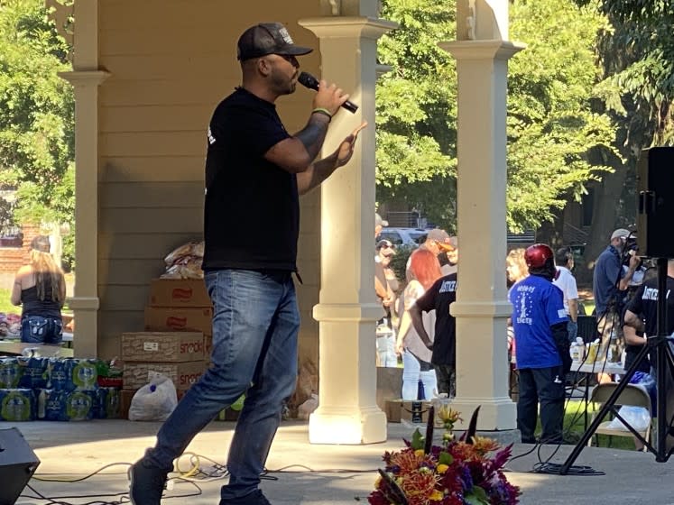 Patriot Prayer leader Joey Gibson speaks in Vancouver, Wash., Saturday at a memorial for slain follower Aaron "Jay" Danielson