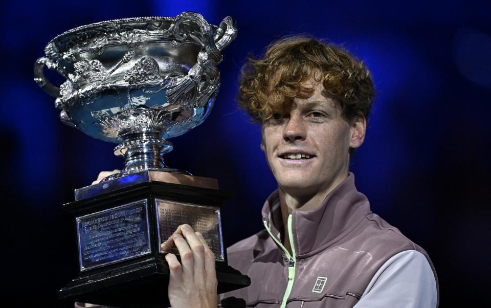 Jannik Sinner holds aloft the Australian Open trophy after beating Daniil Medvedev in the men's singles final - Jannik Sinner kickstarts new era with Australian Open victory over Daniil Medvedev