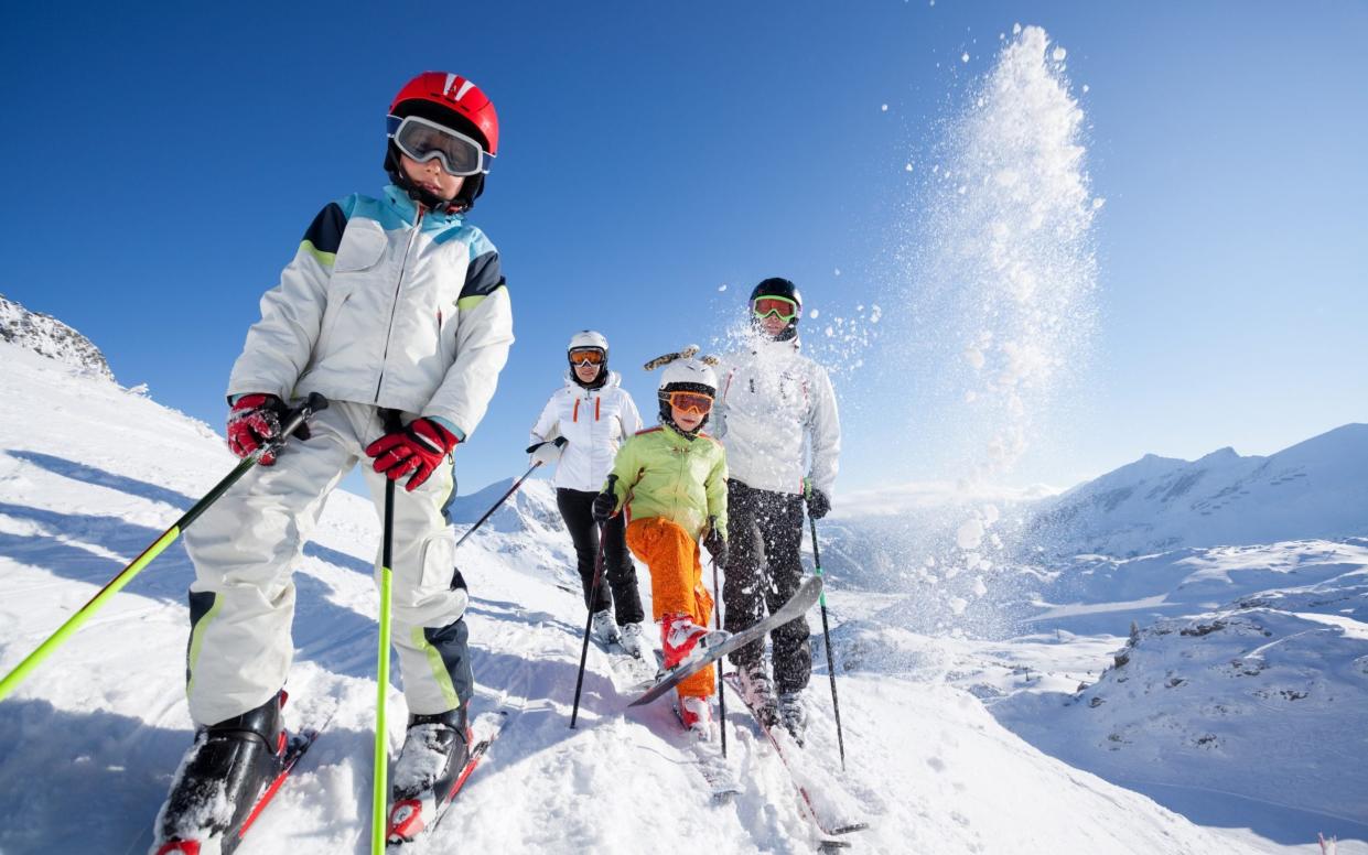 family of skiers - Getty