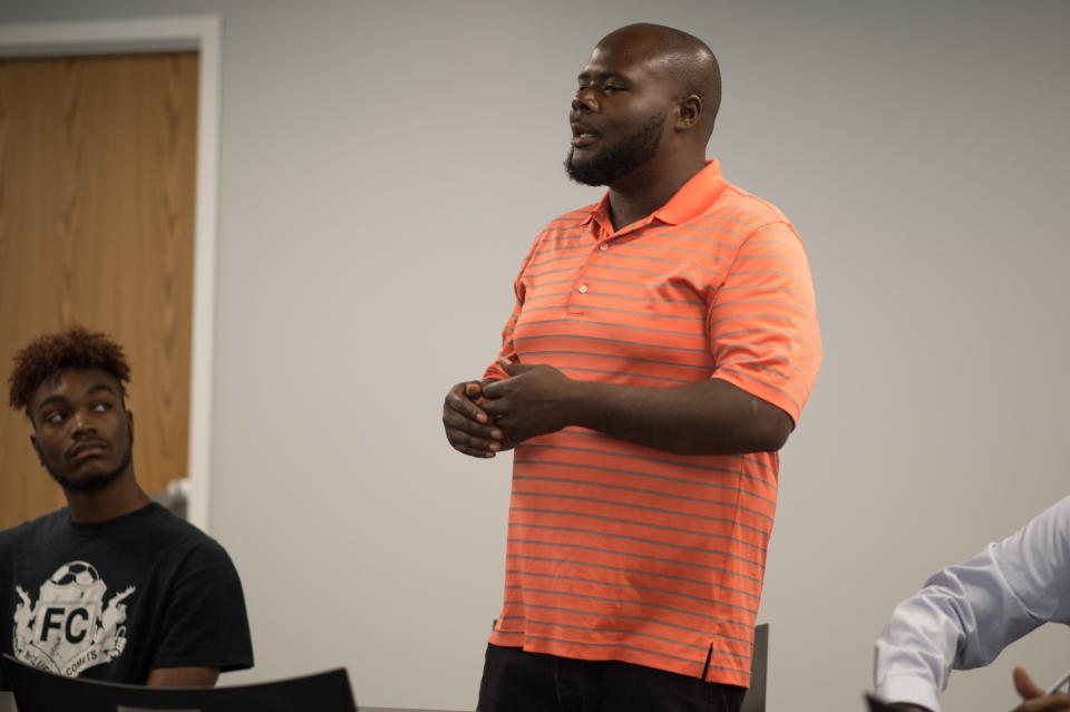 &nbsp;A participant speaks during a 'Save Our Sons' course.