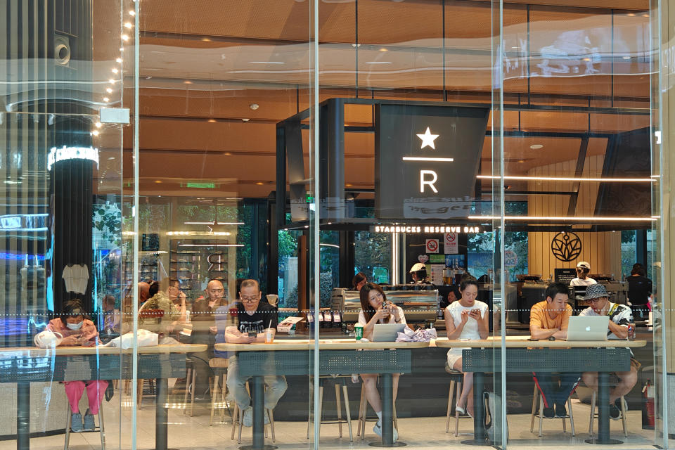 SHANGHAI, China - July 15, 2023 - Customers rest at the Starbucks Reserve in Shanghai, China, July 15, 2023 (Image must read CFOTO/Future Publishing via Getty Images)