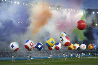 Artists perform prior to the Euro 2020, soccer championship group A match between Italy and Turkey, at the Rome Olympic stadium, Friday, June 11, 2021. (AP Photo/Alessandra Tarantino, Pool)