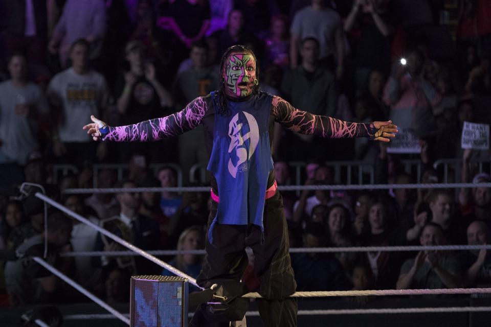 Jeff Hardy enters the ring for tag team action.