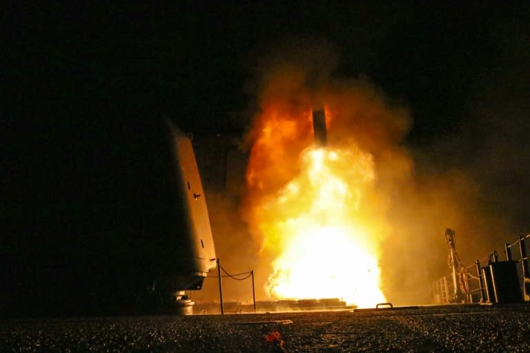 A Tomahawk missile leaves a US warship cruiser on Saturday