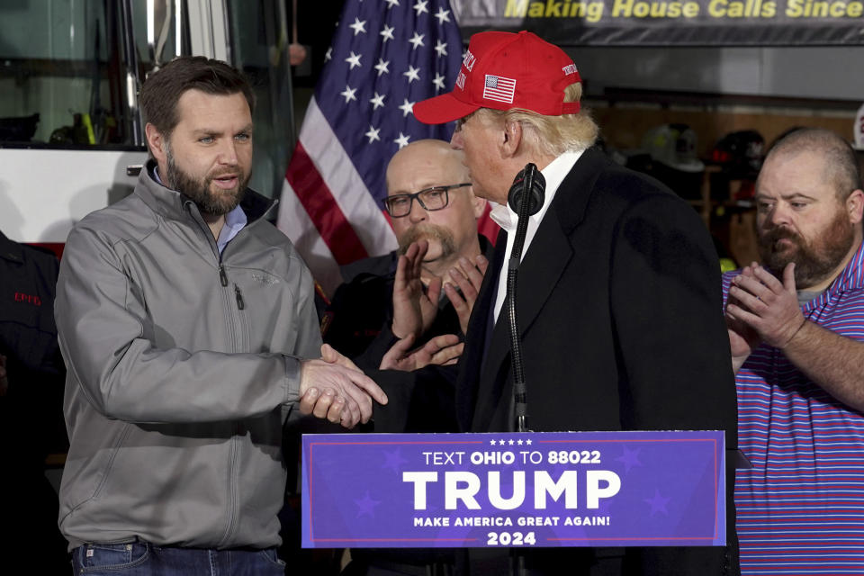FILE - Former President Donald Trump greets Sen. JD Vance, R-Ohio, at the East Palestine Fire Department as he visits the area in the aftermath of the Feb. 3, 2023, Norfolk Southern train derailment in East Palestine, Ohio, Feb. 22. While vice presidential candidates typically aren't tapped until after a candidate has locked down the nomination, Trump's decisive win in the Iowa caucuses and the departure of Florida Gov. Ron DeSantis from the race has only heightened what had already been a widespread sense of inevitability. Vance is considered a close ally of the former president who is among those being considered for the job. (AP Photo/Matt Freed, File)