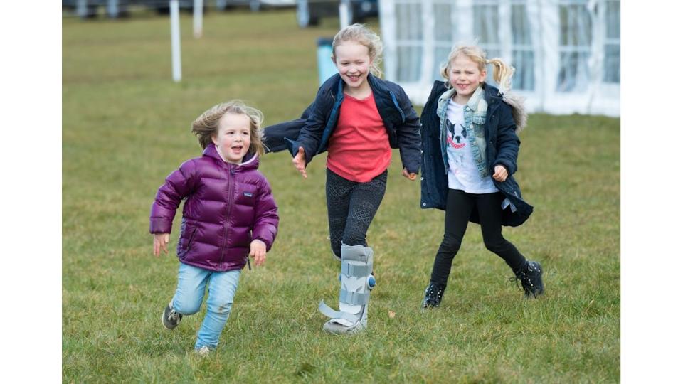 Isla and savannah Phillips play with Mia Tindall