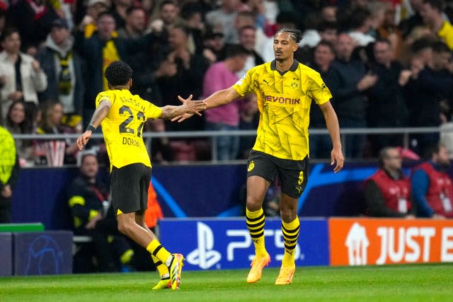 Sebastien Haller, right, got Borussia Dortmund back in the tie