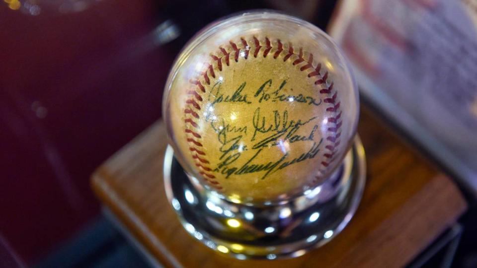 A baseball signed by Jackie Robinson, Jim Gilliam, Joe Black and Ray Campanella on one side and Ty Cobb on the other is featured at the Negro Leagues Baseball Museum in the 18th and Vine Jazz District.
