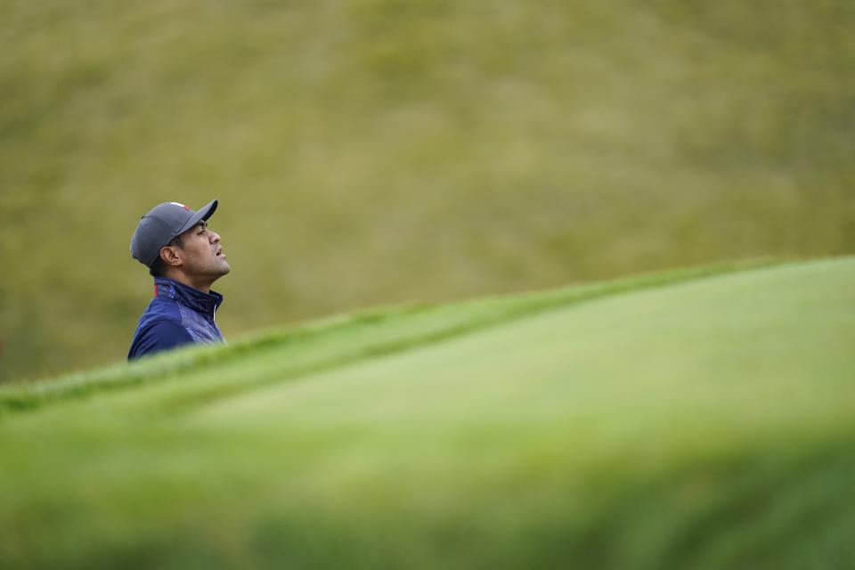 Team USA's Tony Finau looks at a shot on the sixth hole during a practice day at the Ryder Cup at the Whistling Straits Golf Course Tuesday, Sept. 21, 2021, in Sheboygan, Wis. (AP Photo/Ashley Landis)