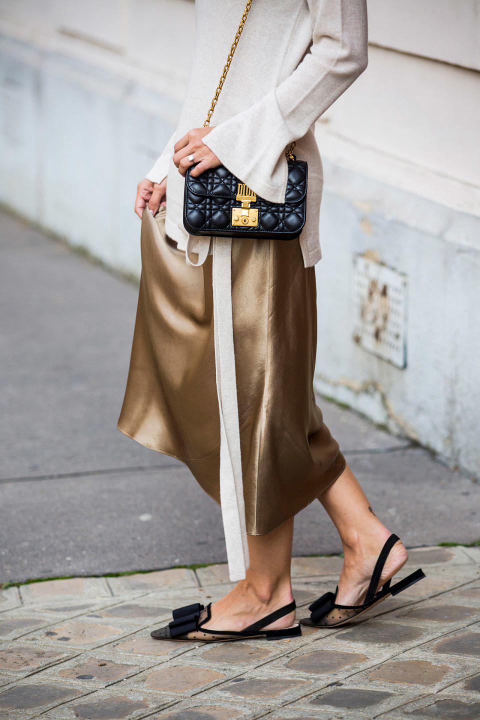 <p>Keep it glossy and polished – elegant pumps, pristine handbags and satin skirts make for an indisputably stylish aesthetic.</p>