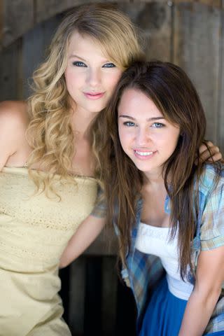 <p>Walt Disney Co./Courtesy Everett Collection</p> Taylor Swift and Miley Cyrus in Hannah Montana: The Movie