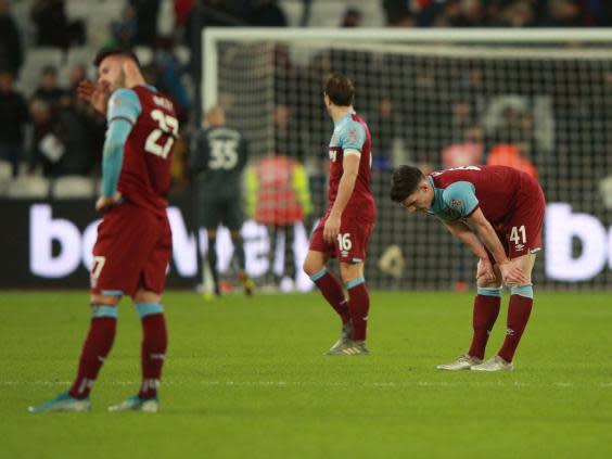 West Ham appear dejected after defeat to West Brom (REUTERS)