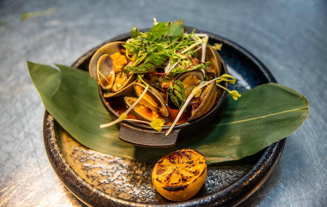 Hearth roasted local clams served “souse style” are one of Chef Tristen Epps’ signature dishes at Ocean Social. Pedro Portal