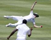 South Africa's Kagiso Rabada celebrates as Chris Morris takes a catch to dismiss England's Alistair Cook (not in picture) during the second cricket test match in Cape Town, South Africa, January 2, 2016. REUTERS/Mike Hutchings