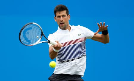 Tennis - WTA Premier - Aegon International - Devonshire Park Lawn Tennis Club, Eastbourne, Britain - June 28, 2017 Serbia's Novak Djokovic in action during his second round match against Canada's Vasek Pospisil Action Images via Reuters/Matthew Childs