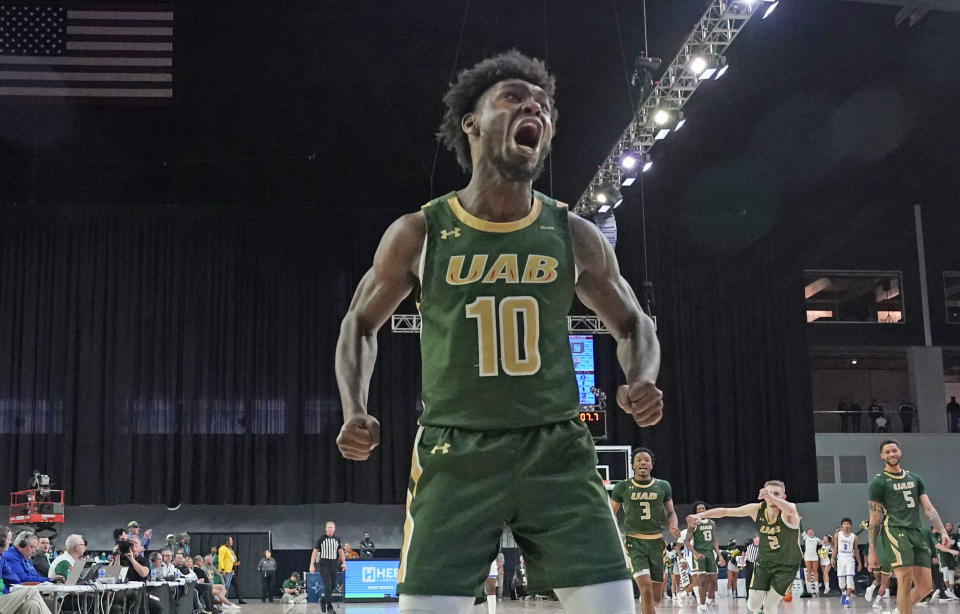 UAB guard Jordan Walker (10) reacts to hitting a basket late in the second half of an NCAA college basketball game against Middle Tennessee in the semifinal round of the Conference USA tournament in Frisco, Texas, Friday, March 11, 2022. (AP Photo/LM Otero)