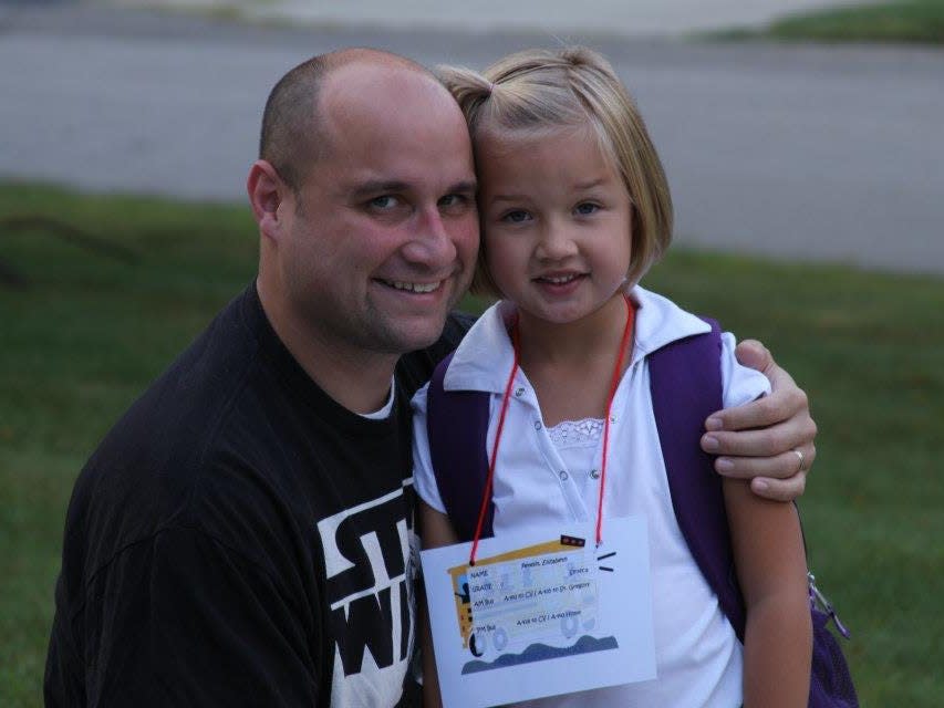 Ray and Elizabeth Petellin on the latter's first day at kindergarten.