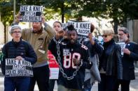 Demonstrators rally outside the NFL owners meeting in New York City, NY, U.S. October 17, 2017. REUTERS/Brendan McDermid